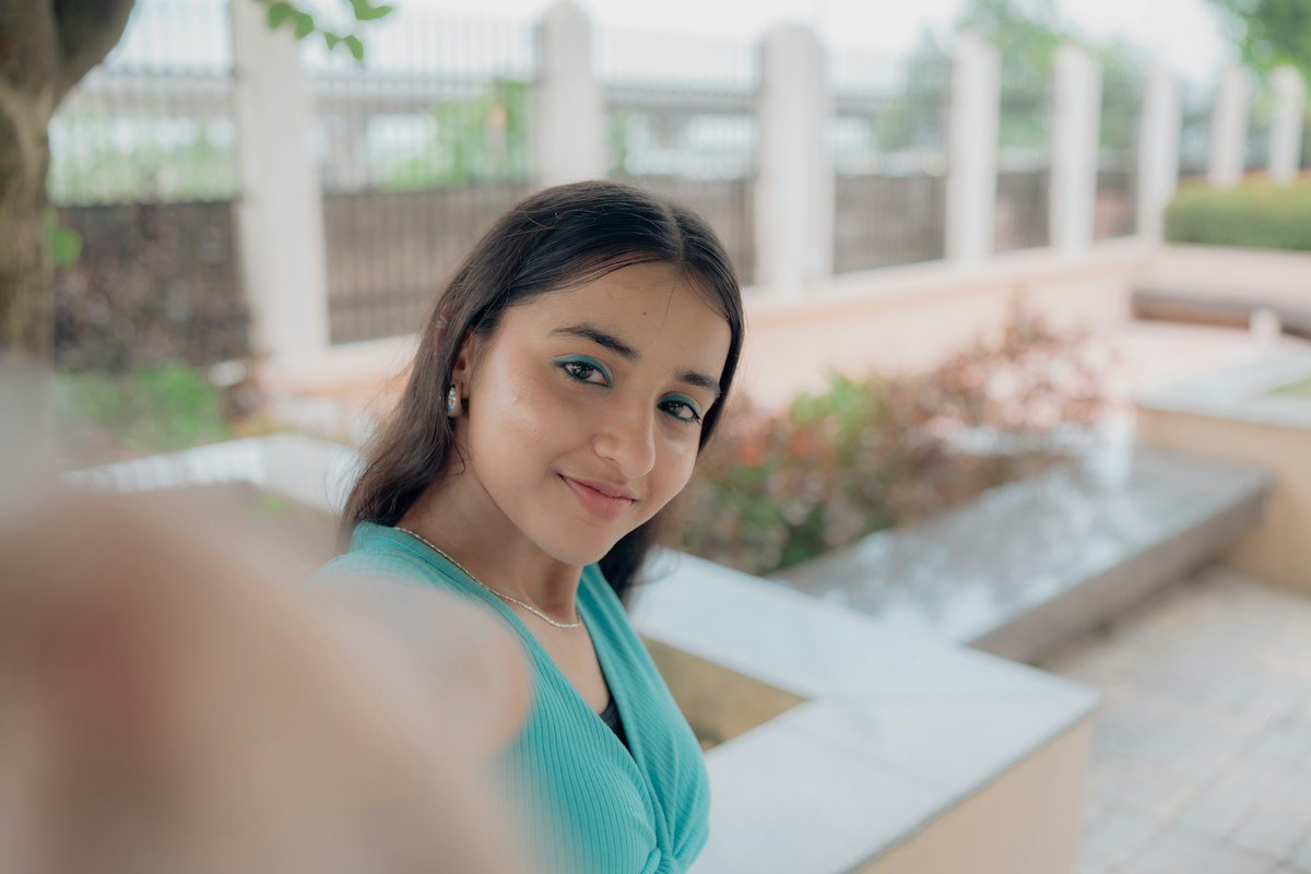 Young Indian woman looking outward with bright, clear, unassisted vision